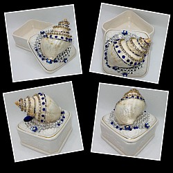 SOLD. Small porcelain box with a beautiful embellished seashell with rhinestones and jewels. 4”x4”x4.5”H. $25